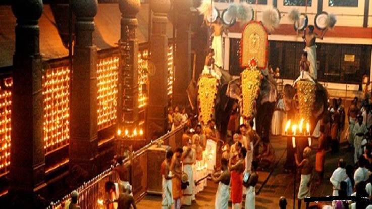 Hindu temple festival crowd and elephant procession in Thrissur Kerala